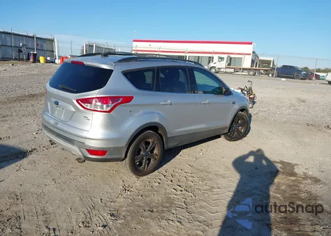 2014 Ford Escape Se z USA, uszkodzony, nr VIN 1FMCU9GX9EUA57799